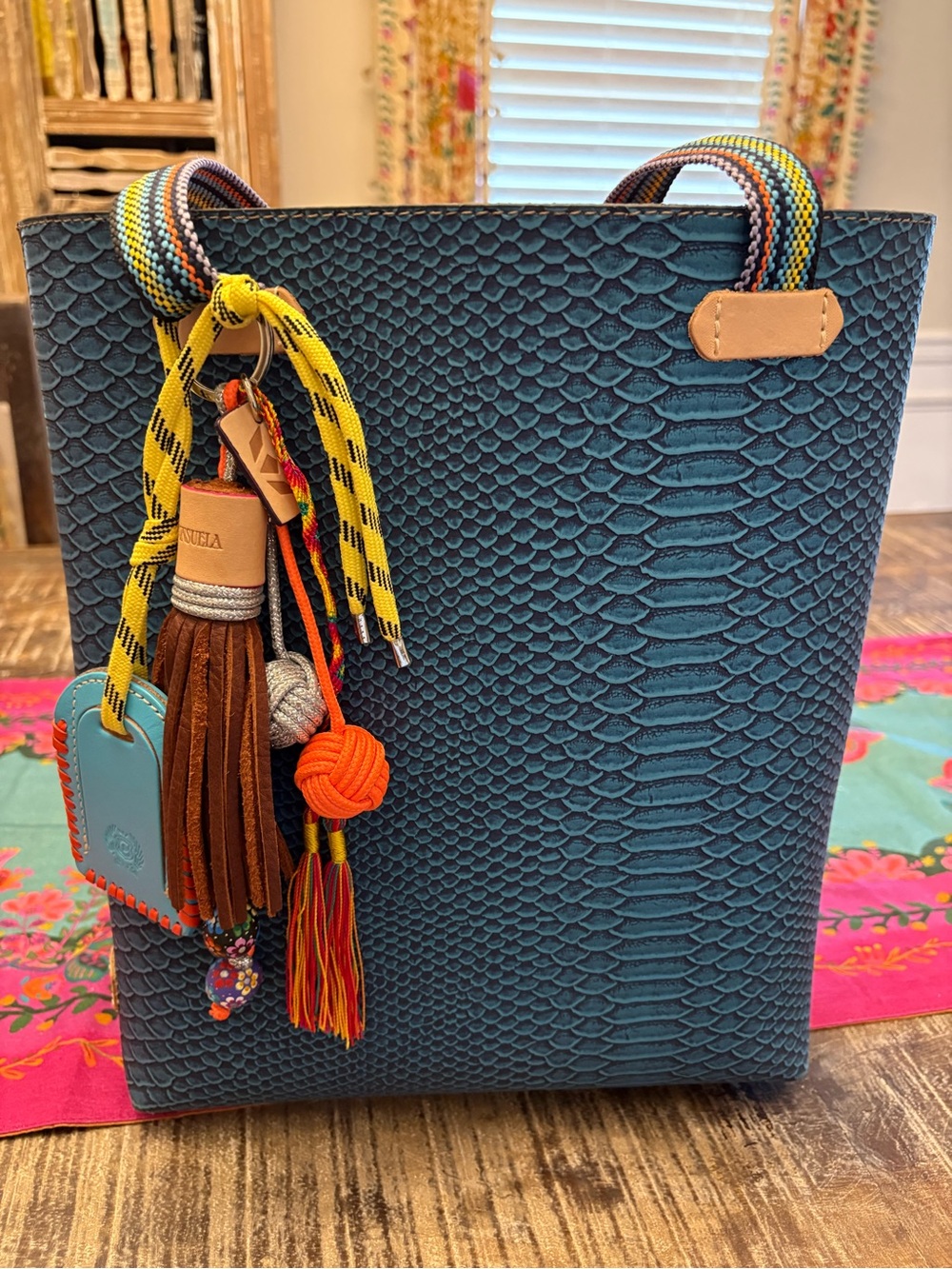 Consuela Indy Everyday Tote Blue Textured Tote Bag with Colorful Tassel Charm